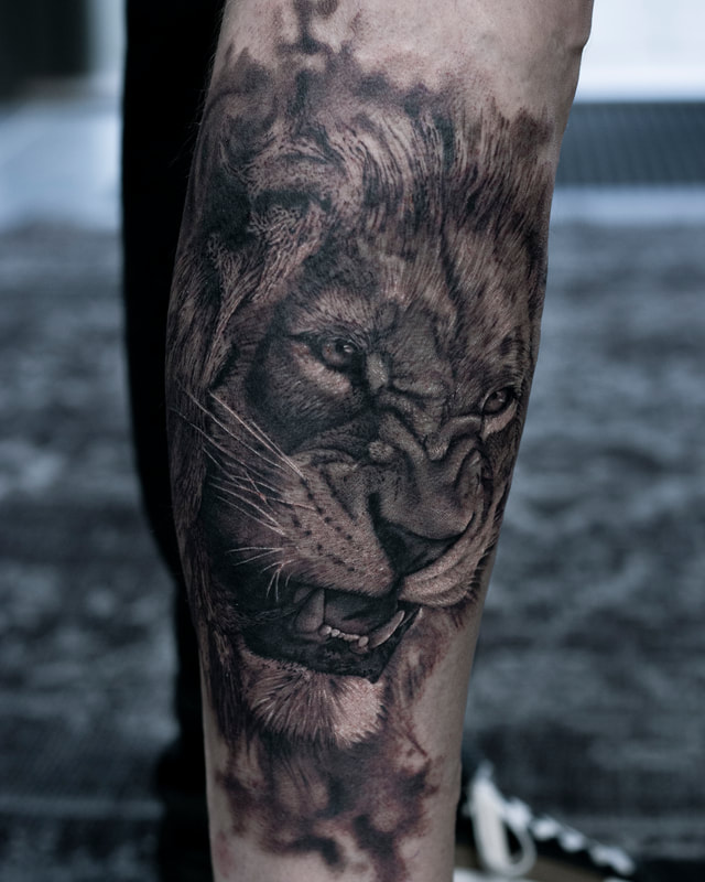 adele munday everblack tattoo studio sheffield realism blackwork lion nature animals