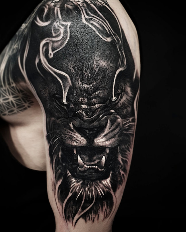 steve upton everblack tattoo studio sheffield blackwork lion dark gothic