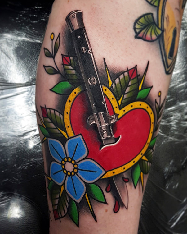 steve upton everblack tattoo studio sheffield trad realism dagger heart